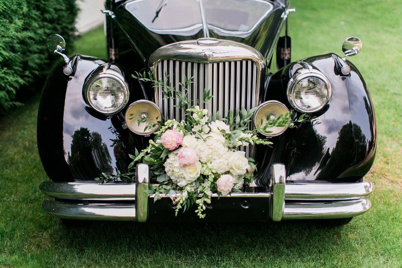 Classic Jaquar car at a wedding in Northern Michigan
