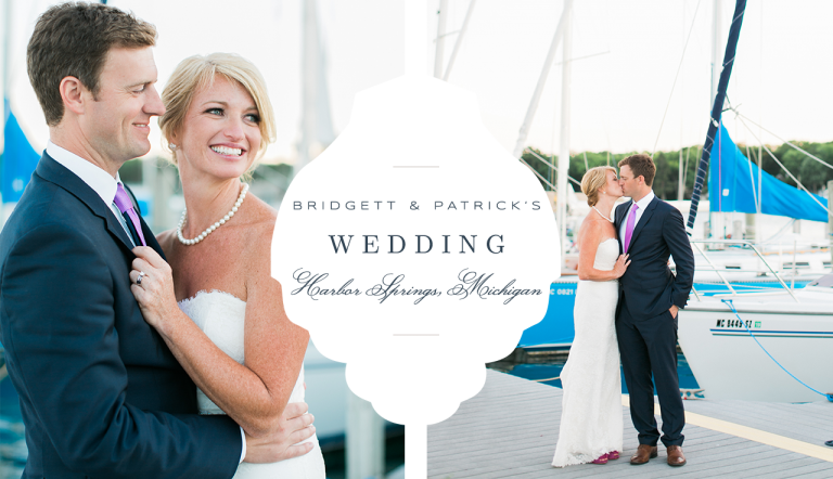 A bride and groom taking photos at a marina in Harbor Springs, Michigan