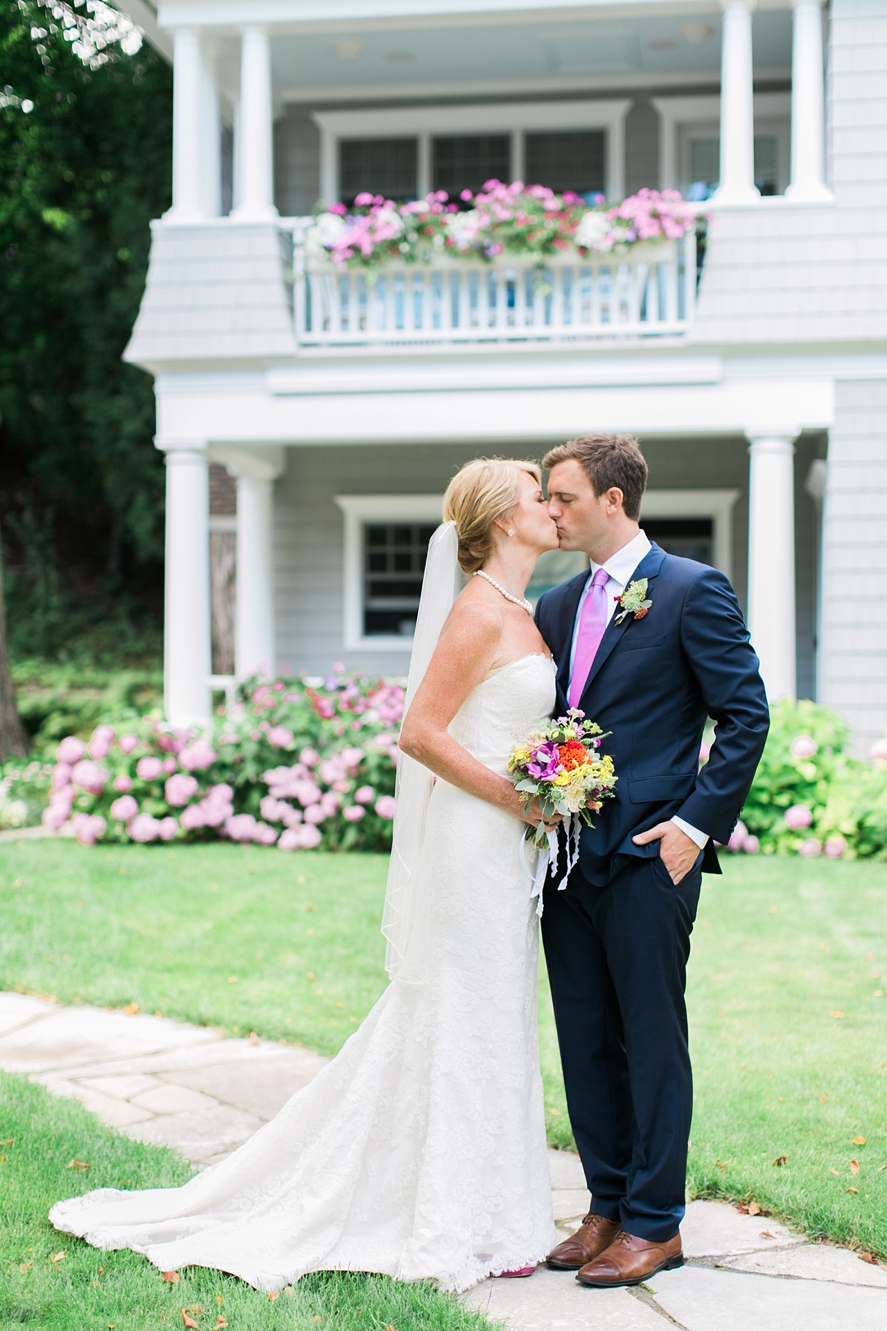 A bride and groom kissing on their wedding day in Northern Michigan.