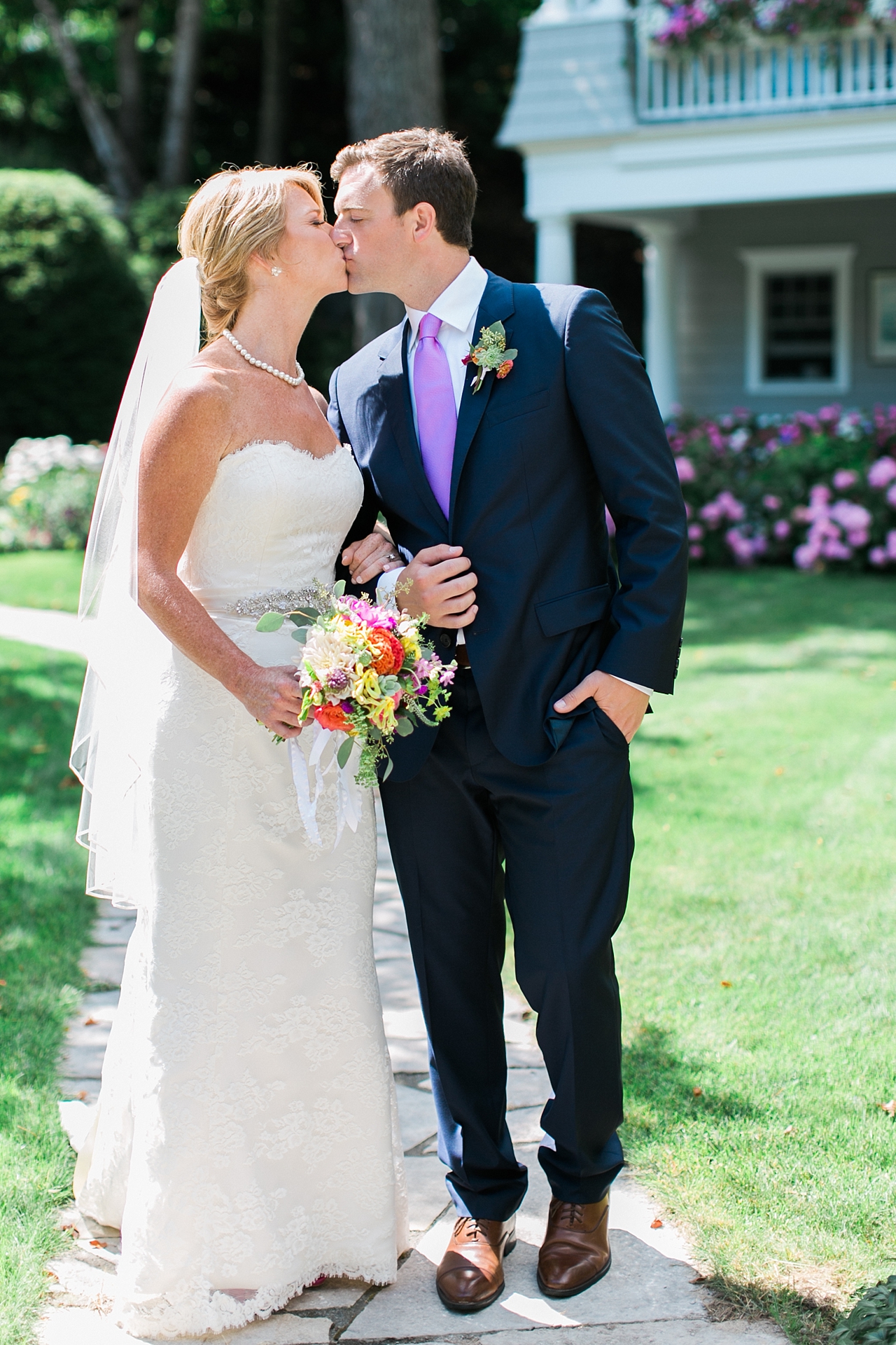 A bride and groom kissing in Northern Michigan