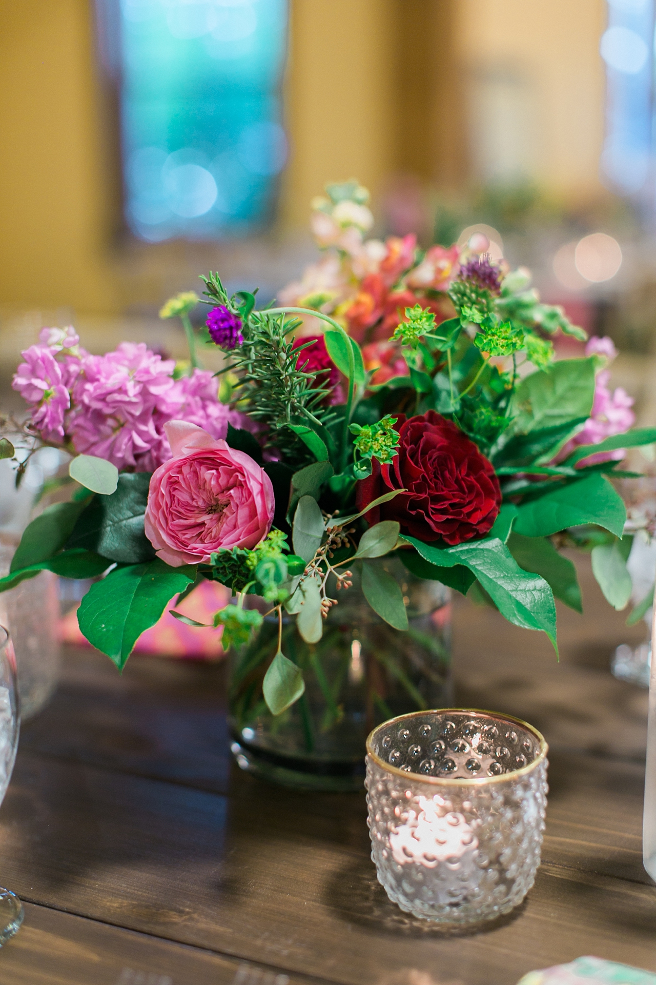 Beautiful pink and red wedding floral arrangement 