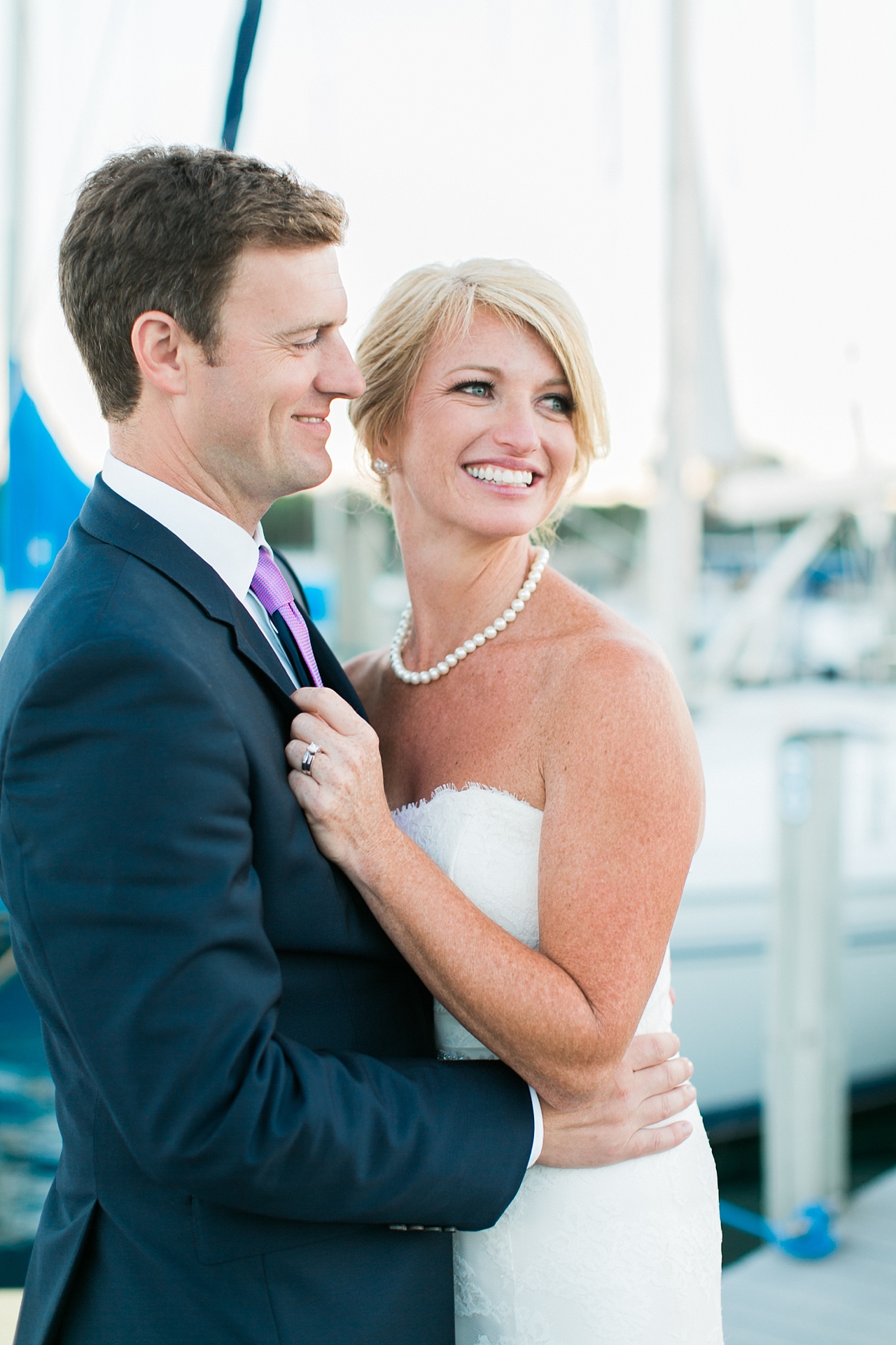 Bride and groom portraits on the water in Northern Michigan