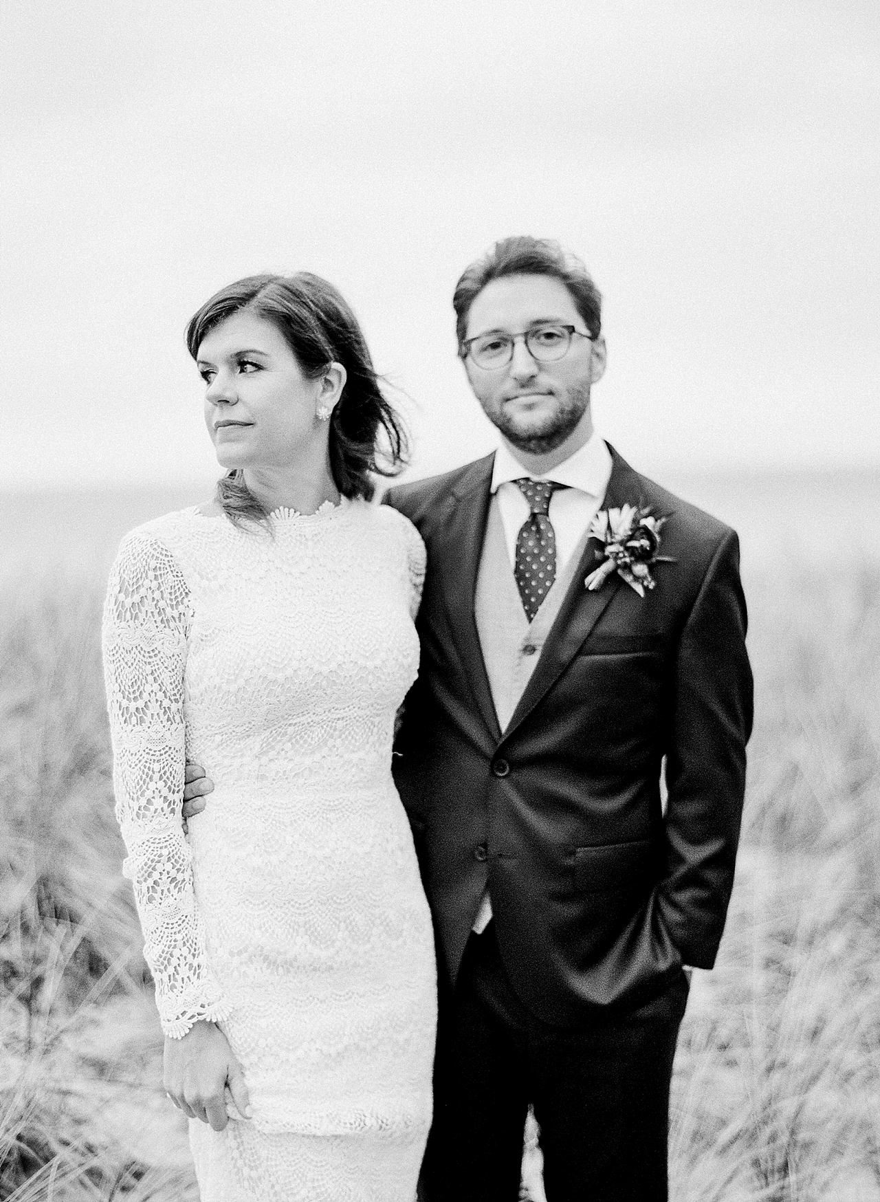 A bride and groom at Sleeping Bear Dunes in Glen Arbor, Michigan