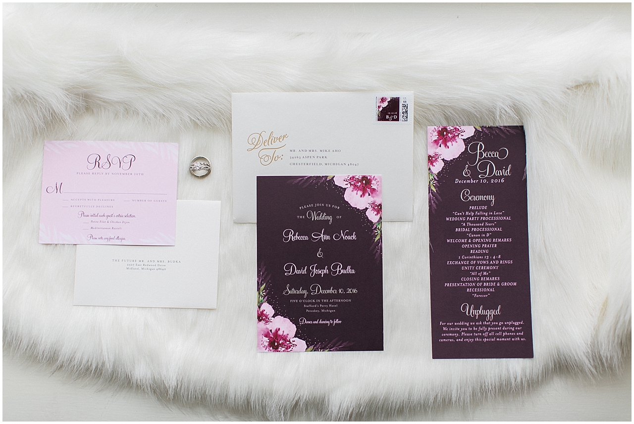 A deep purple wedding invitation suite