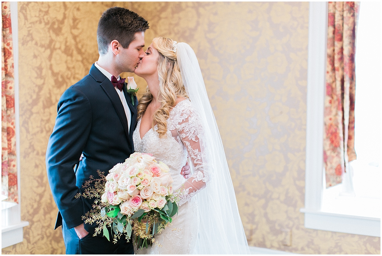 A bride and groom kissing in Petoskey, Michigan