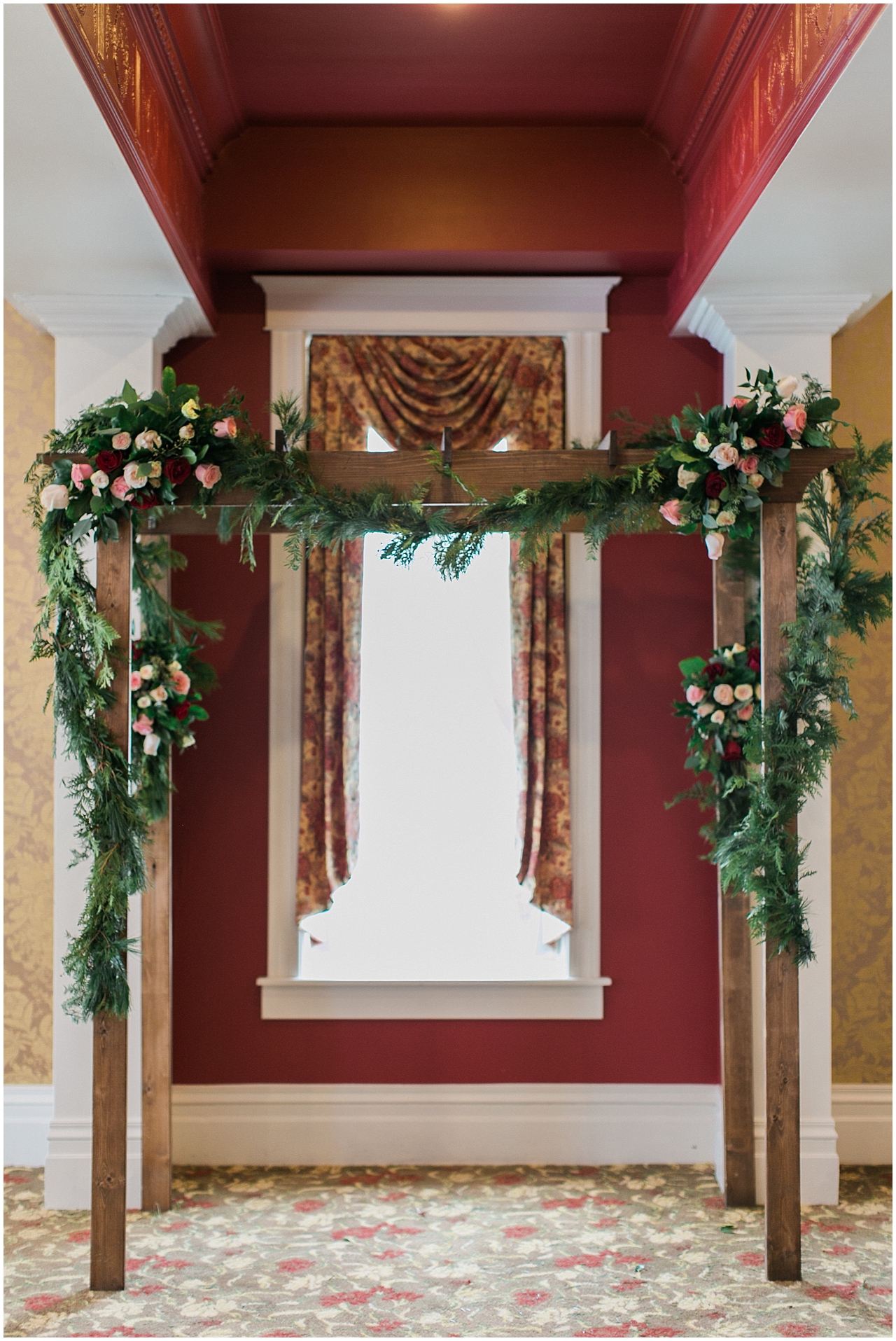 A wedding ceremony arch at the Stafford's Perry Hotel