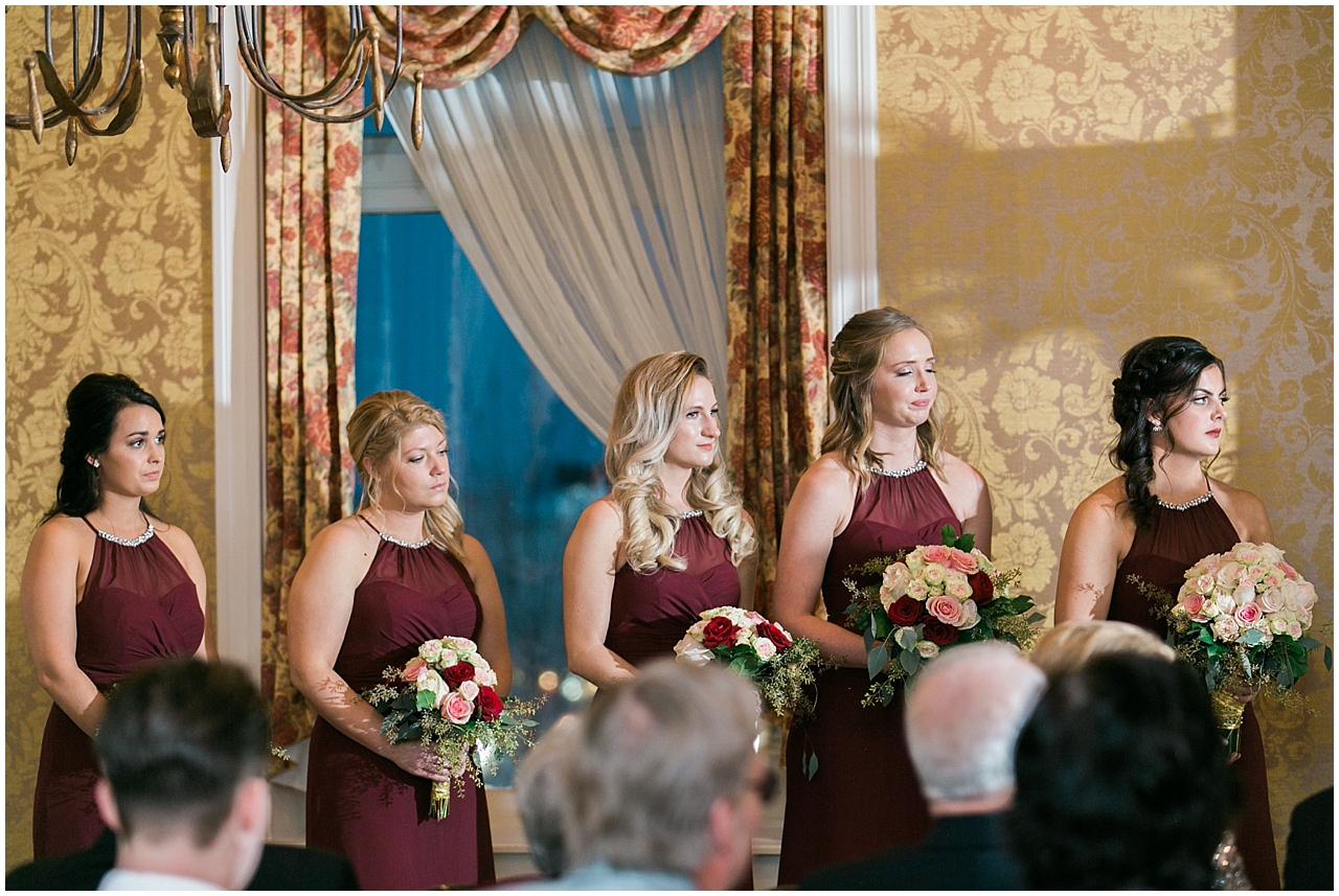 Bridesmaids at a wedding ceremony at the Stafford's Perry Hotel