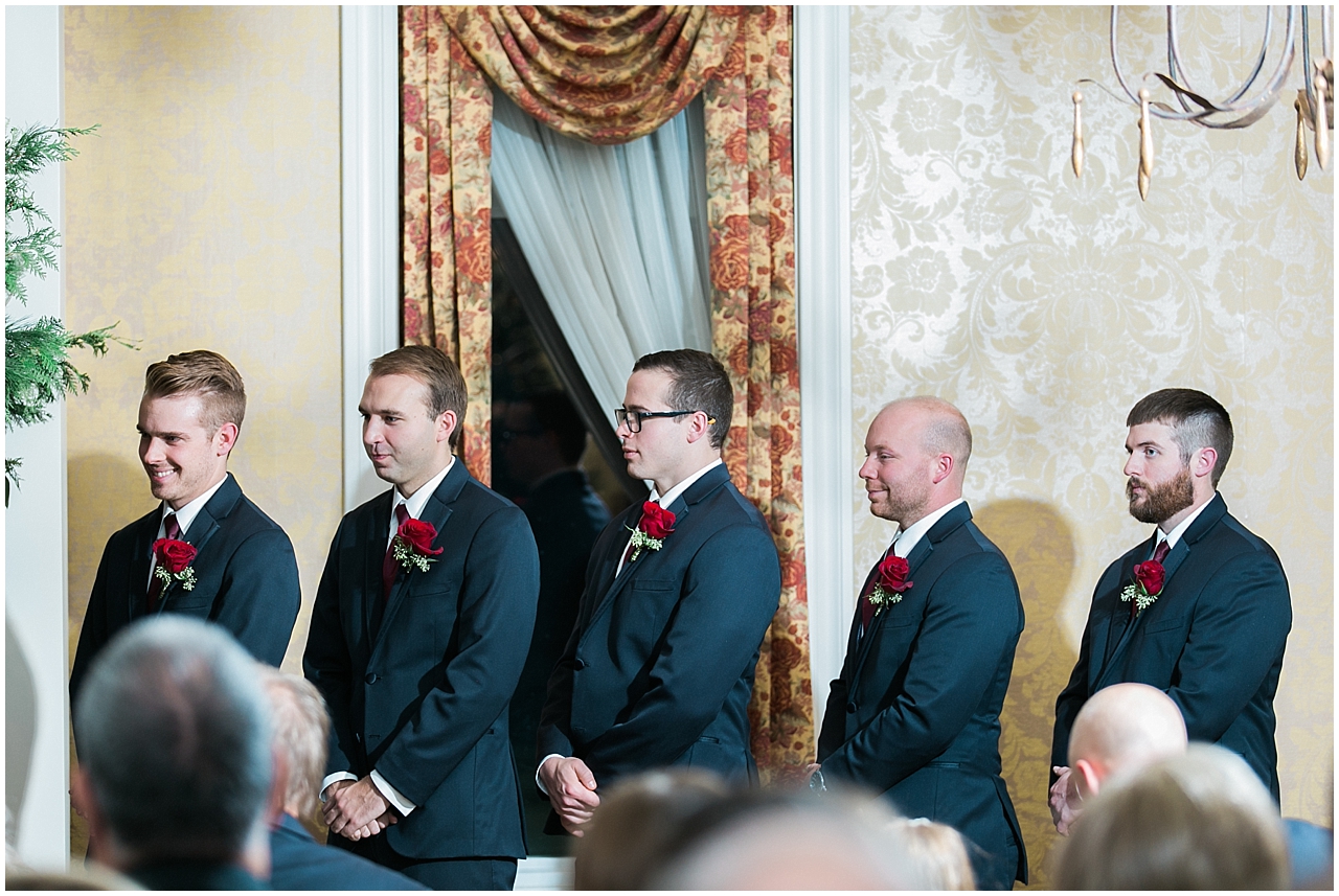 Groomsmen at a wedding ceremony at the Stafford's Perry Hotel