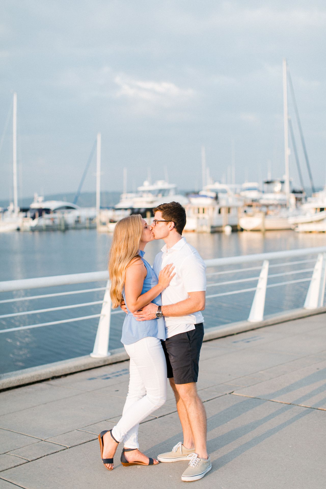 This is couple kissing at a marina in Traverse City, Michigan