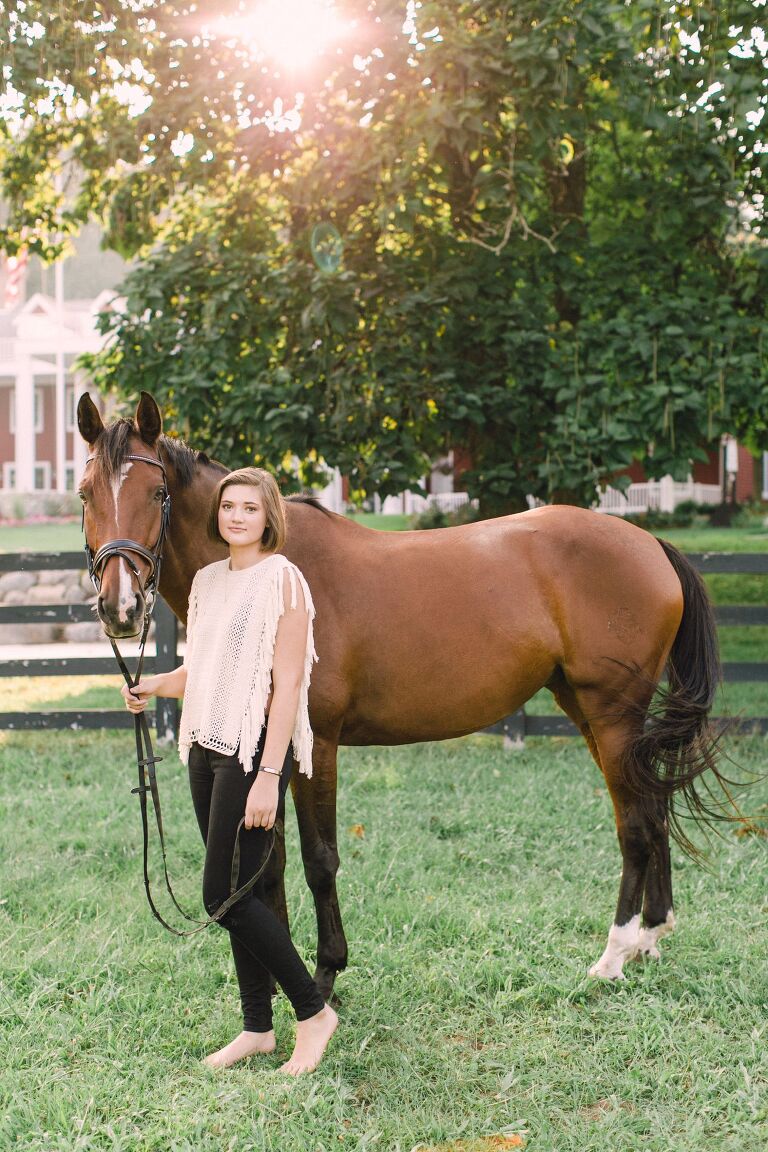 A girl with her horse for her senior portraits