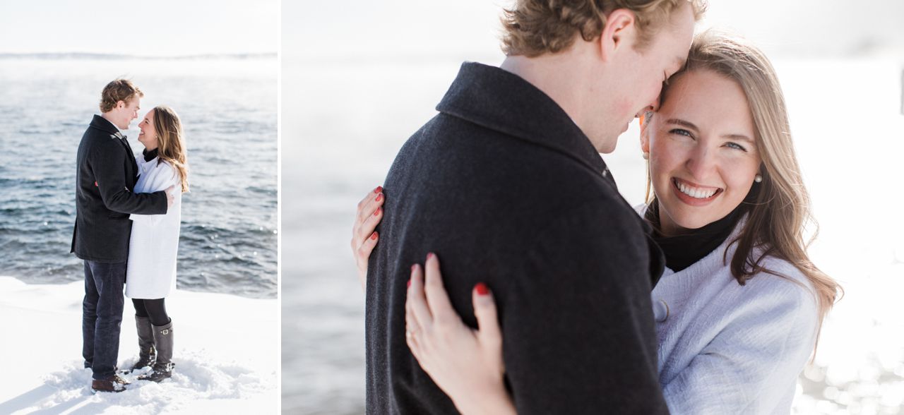 This is a couple smiling at each other while taking photos on Little Traverse Bay