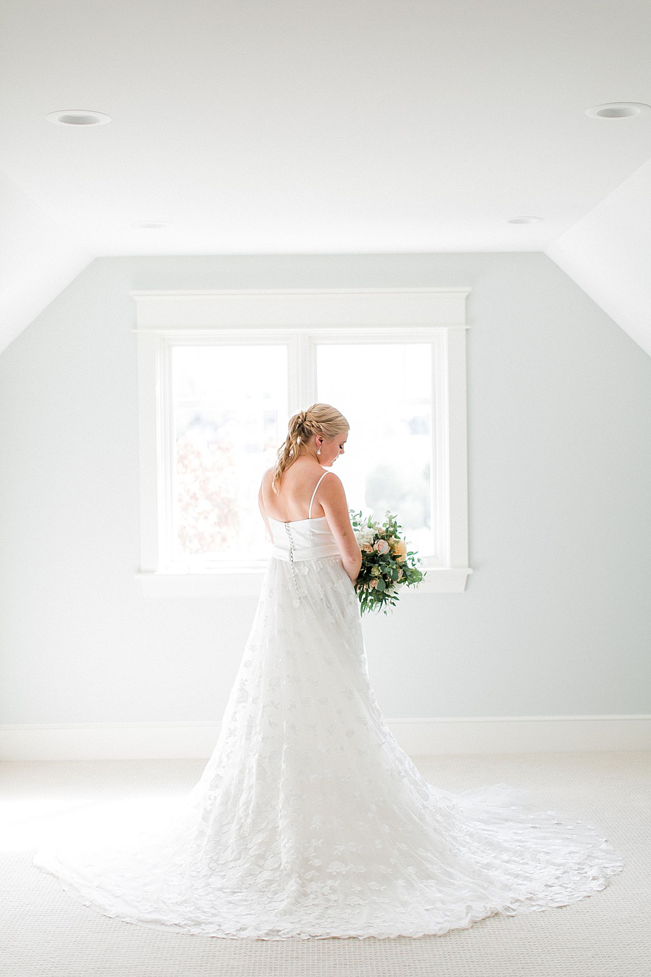 Bride portrait in front of a window