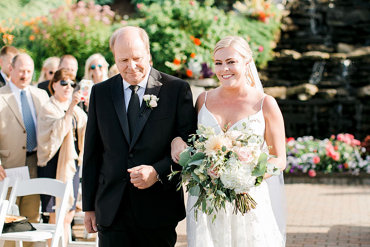 Bride walking down the aisle in Bay Harbor, Michigan