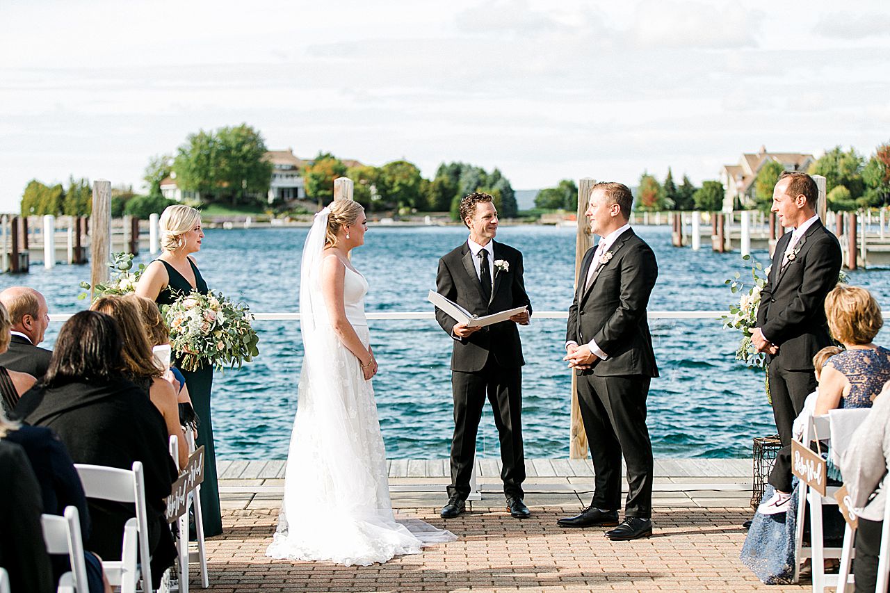 Exchange of vows right in front of the water in Northern Michigan