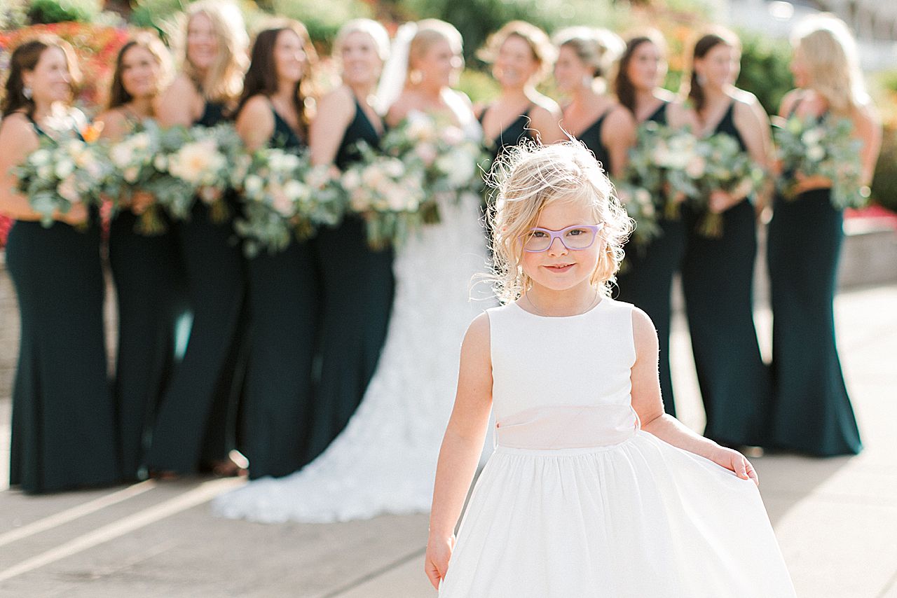 Youngest member of the bridal party posing for a photo