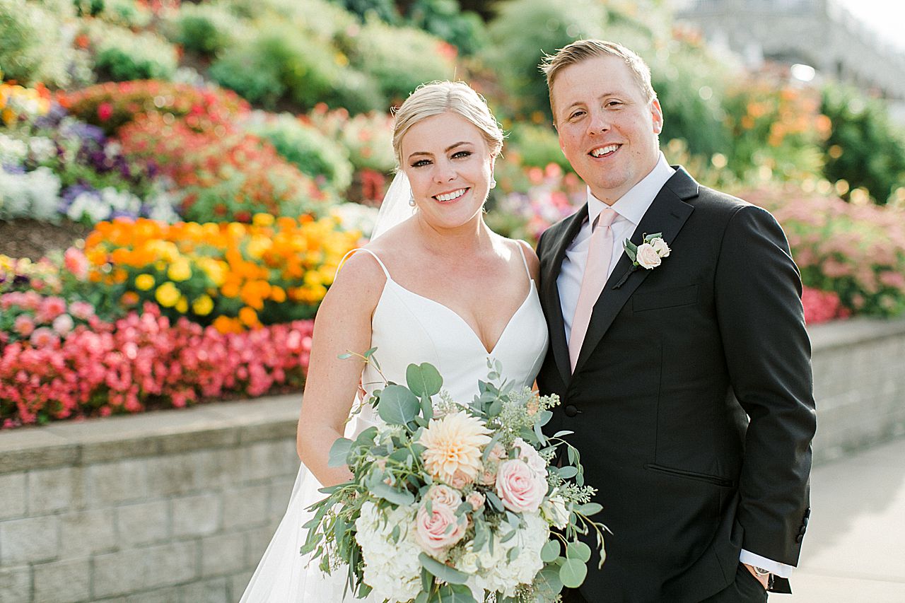Bride and groom portraits outside of the Bay Harbor Yacht Club in Michigan