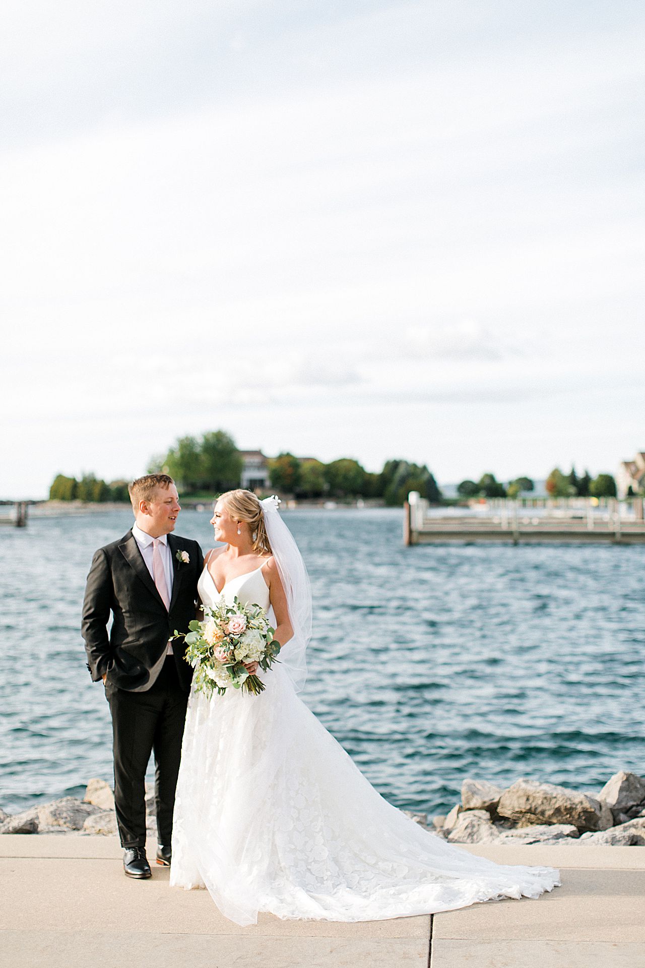 Lakeside bride and groom portraits