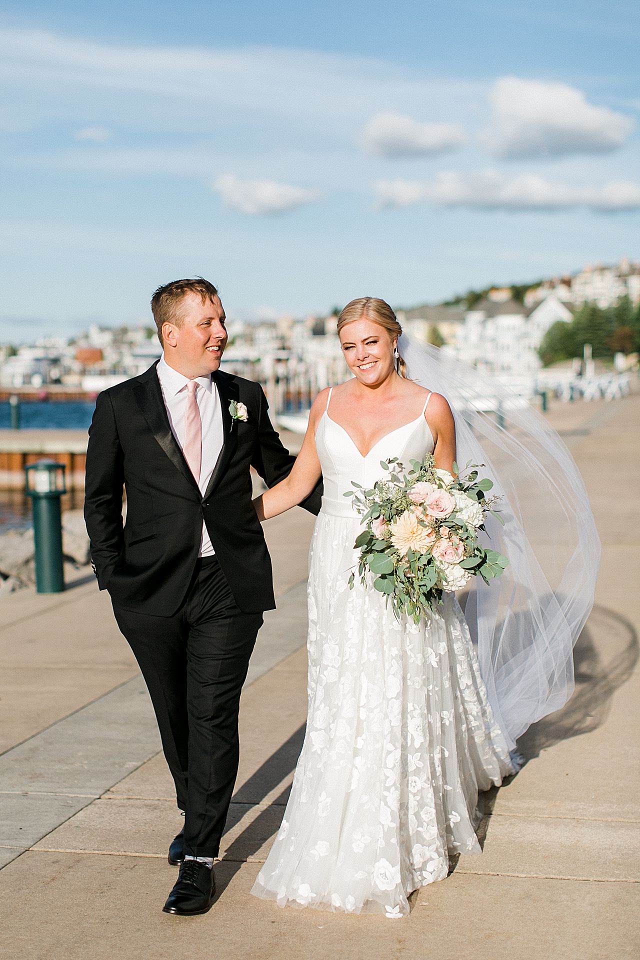 Couple walking around Bay Harbor, Michigan