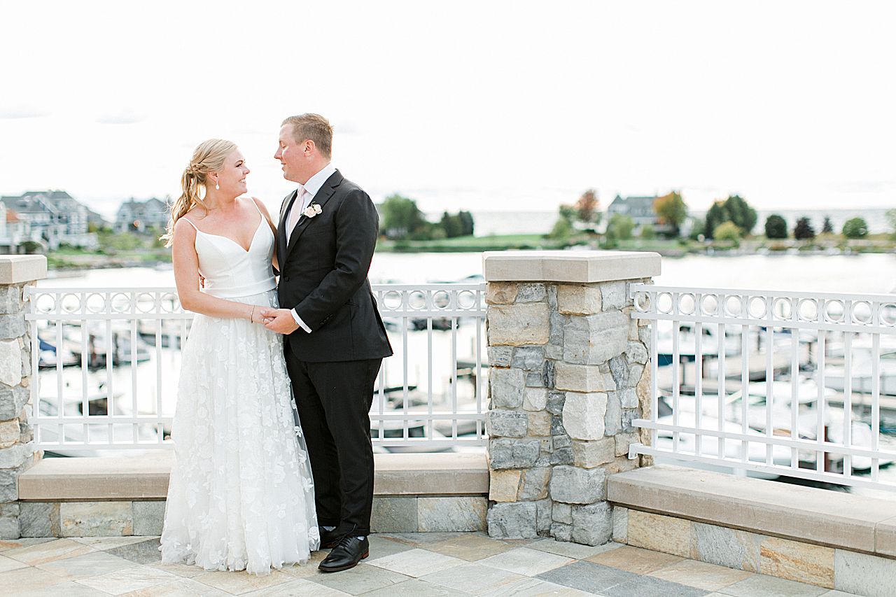 Bride and groom on the balcony at Bay Harbor Yacht Club