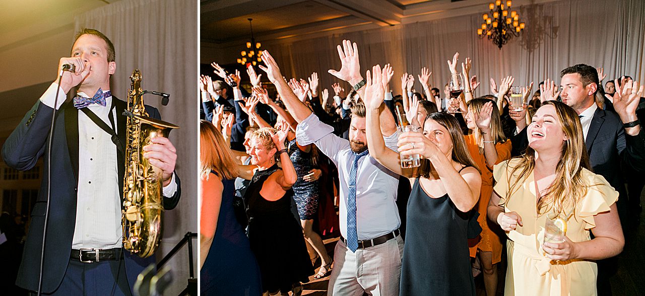 Wedding guests singing and dancing with the band