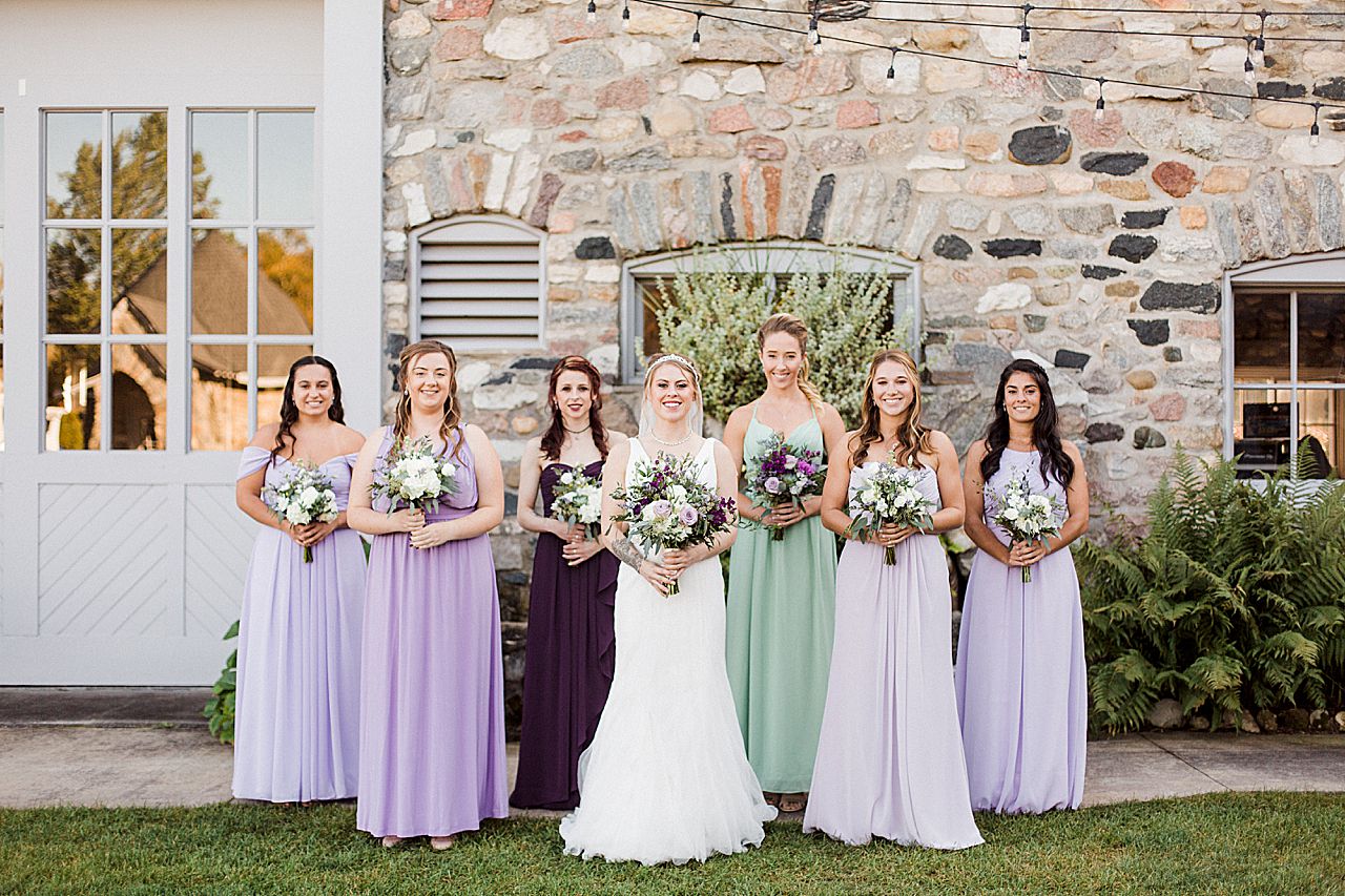 This is a photo of a bride with her bridesmaids at Castle Farms