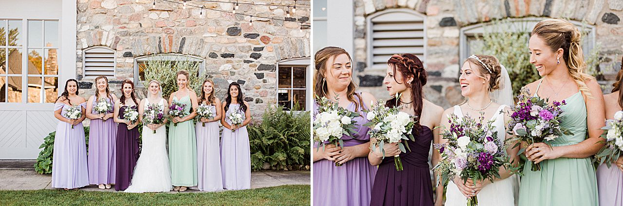 This is a photo of a bride with her bridesmaids who are wearing purple dresses in Charlevoix, Michigan