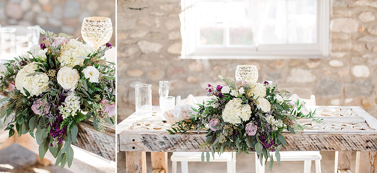 Sweetheart wedding reception table at Castle Farms with white hydrangeas and roses with purple accents