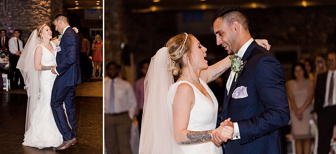 A bride and groom sharing their first dance during their reception in the Knight's Castle at Castle Farms in Charlevoix, Michigan