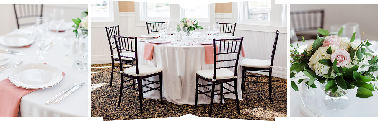 A wedding reception table with white linen and pink napkins