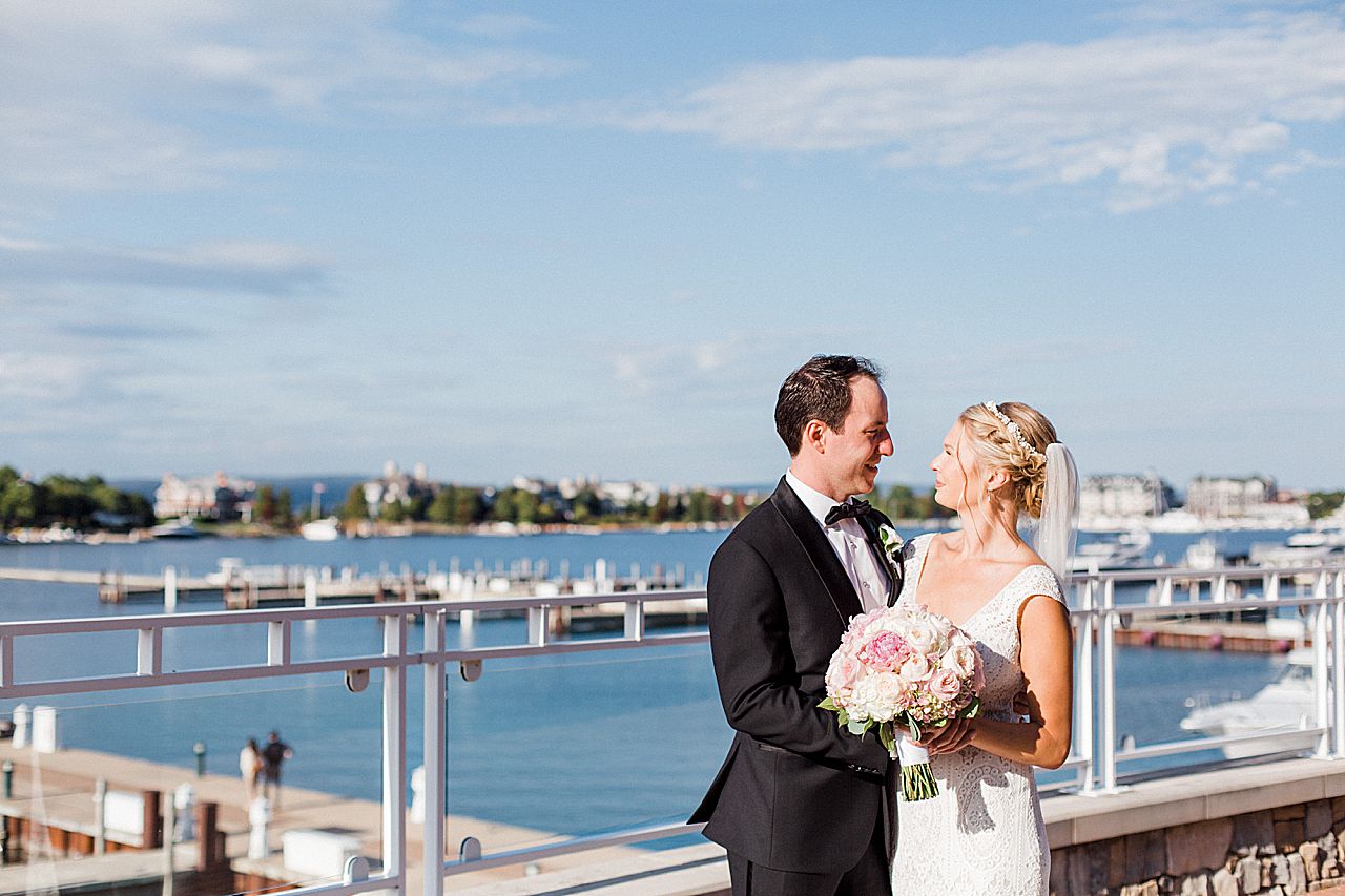 Couple looking at each other in the sunshine at the BHYC
