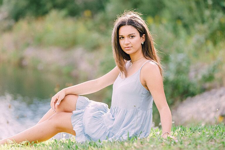 High school senior in the grass in Northern Michigan