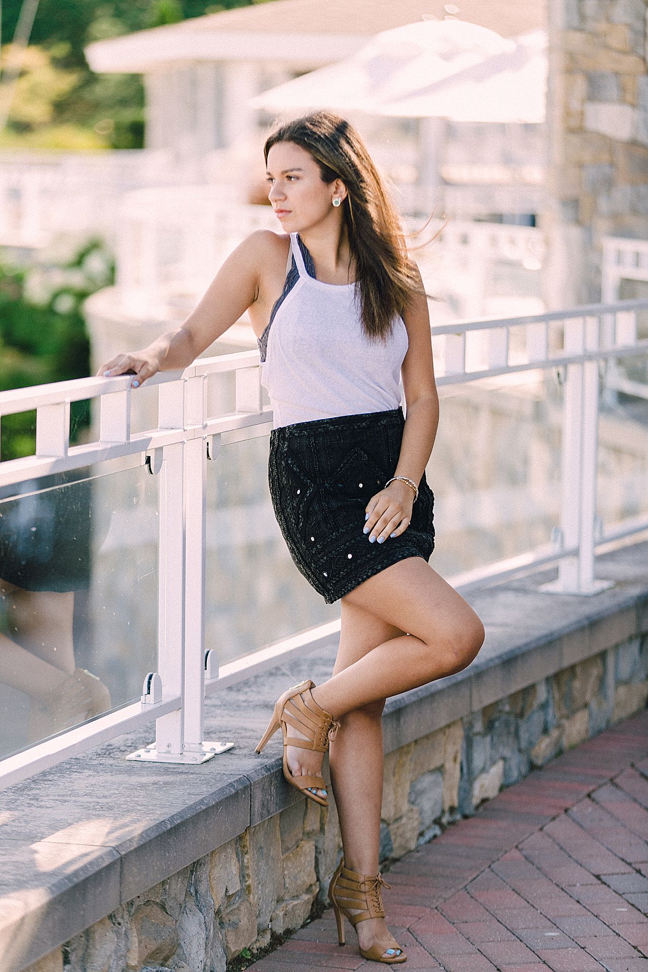 Girl looking off to Lake Michigan from a deck