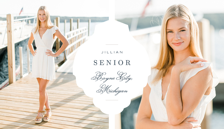 This is a photo of a senior portrait at a marina on the lake on a sunny day in Boyne City, Michigan