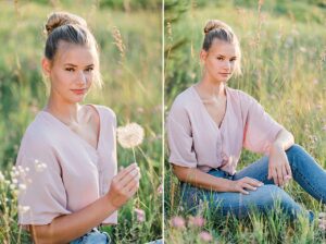 This is a senior portrait of a girl sitting in a field Northern Michigan surrounded by pink flowers