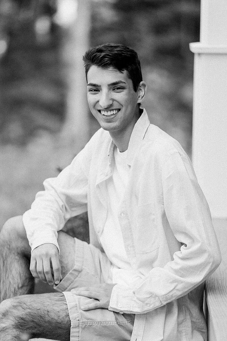 High school Senior smiling for a photo in Northern Michigan