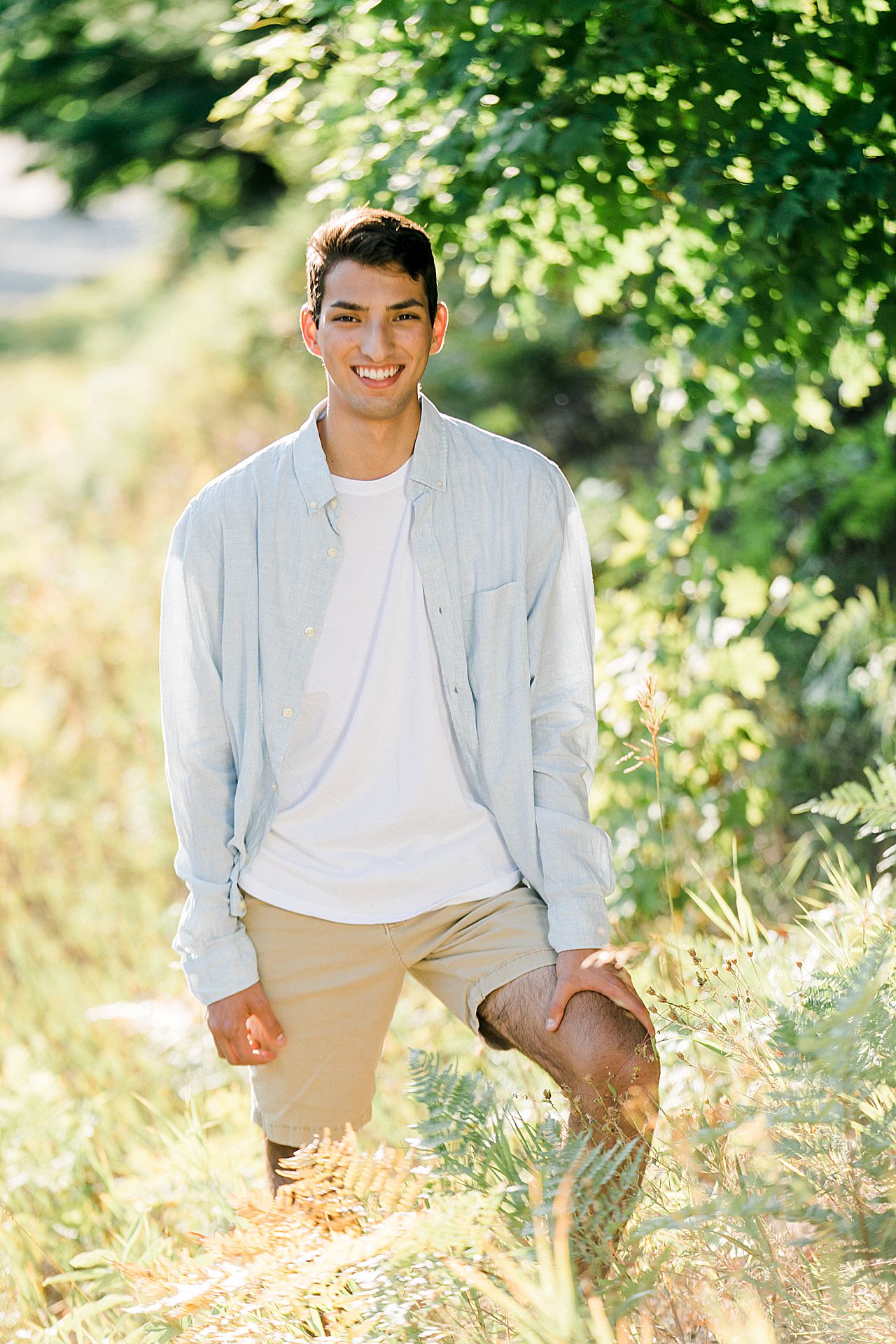Teenager posing for a photo during sunset in Northern Michigan