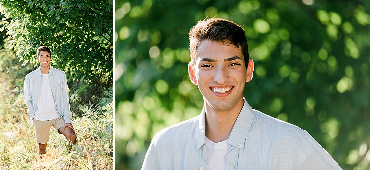 A senior portrait in a grassy field at sunset in Northern Michigan