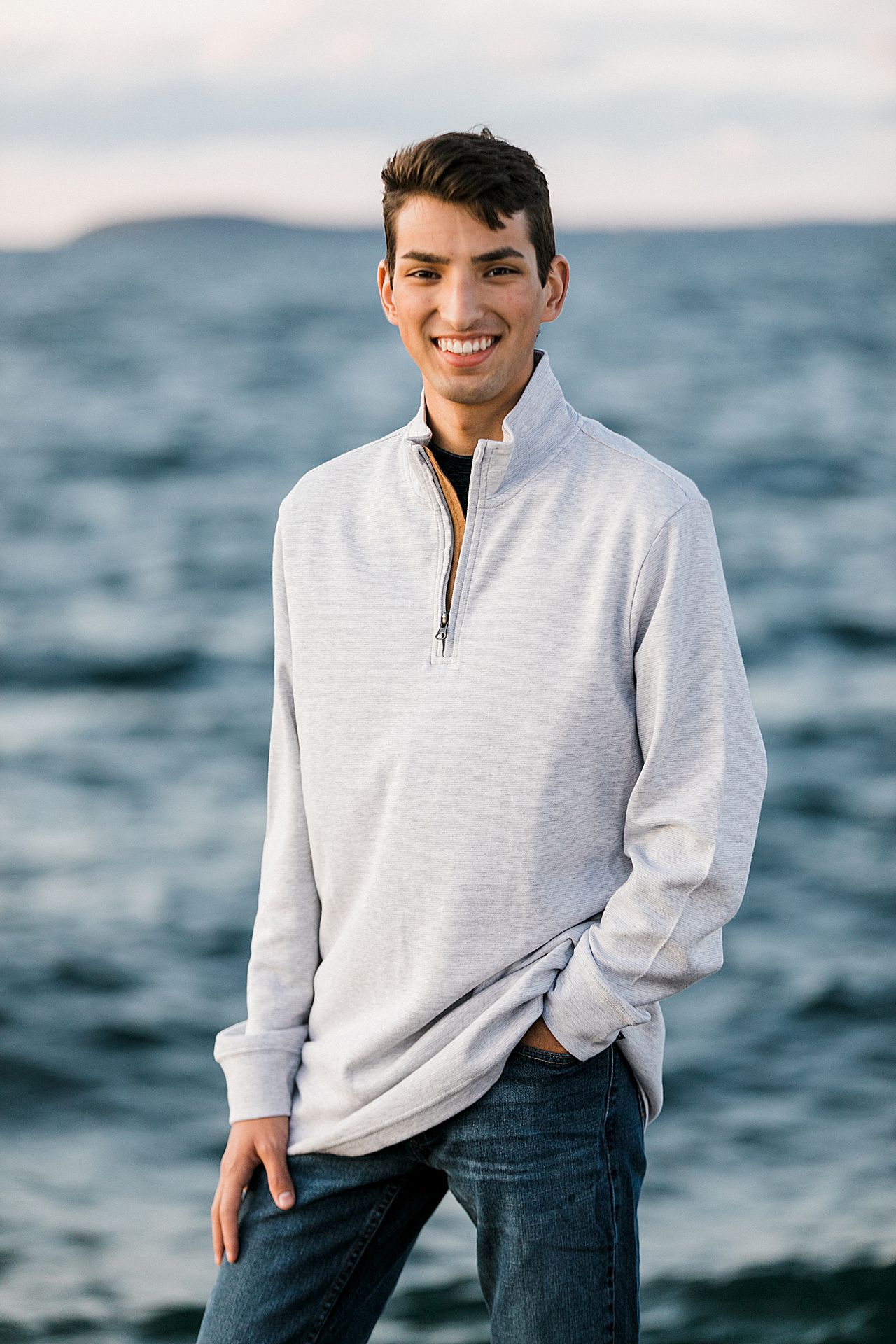 Lakeside senior portraits during sunset
