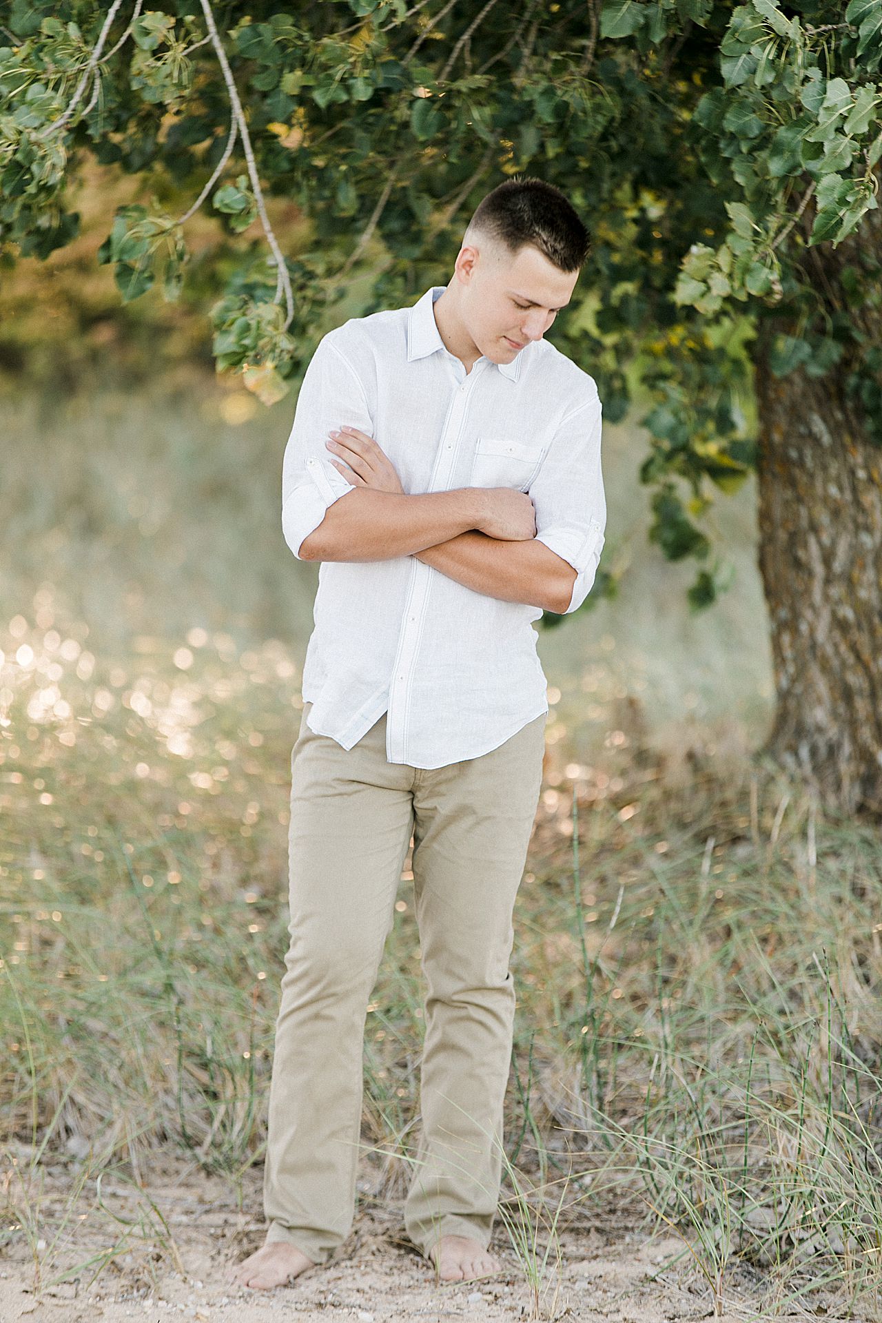 This is a senior portrait on the lakeshore in Northern Michigan