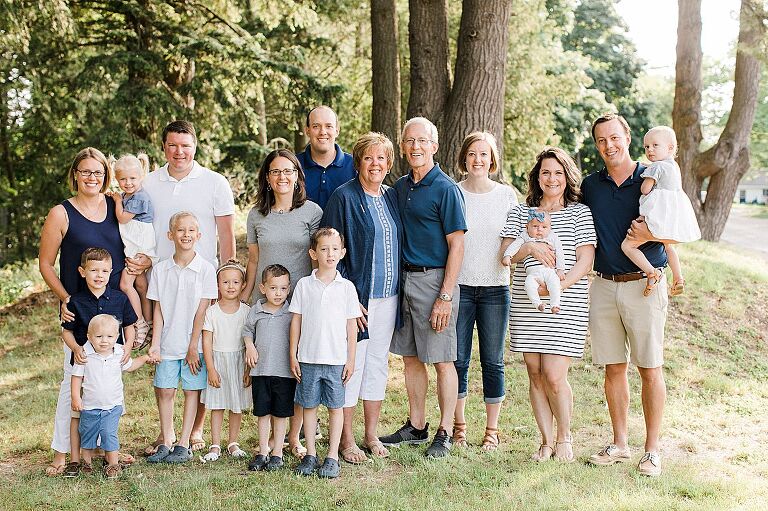 Large family portrait in the woods in Charlevoix, Michigan