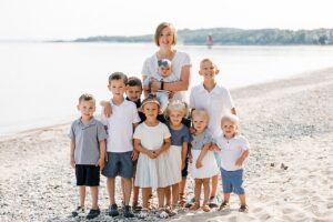 Aunt with all her nieces and nephews on a beach in Northern Michigan