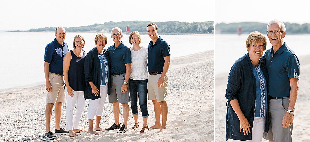 Parents with their four grown kids on a beach in Charlevoix, Michigan