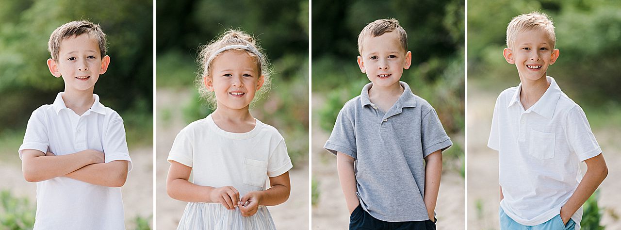 Four young siblings on a beach in Charlevoix, Michigan