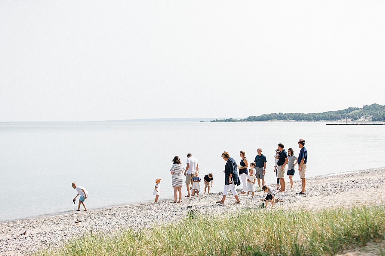 Big family exploring on the Lakeshore of Lake Michigan