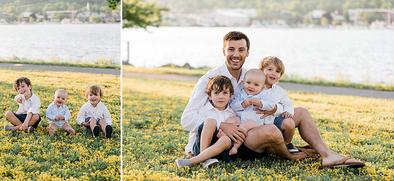 Father sitting with his three young boys in Northern Michigan