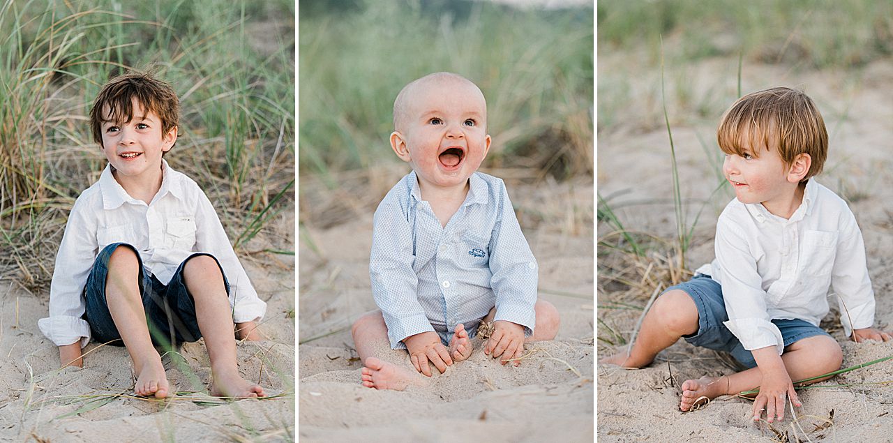 Three brothers playing in the sand in Northern Michigan