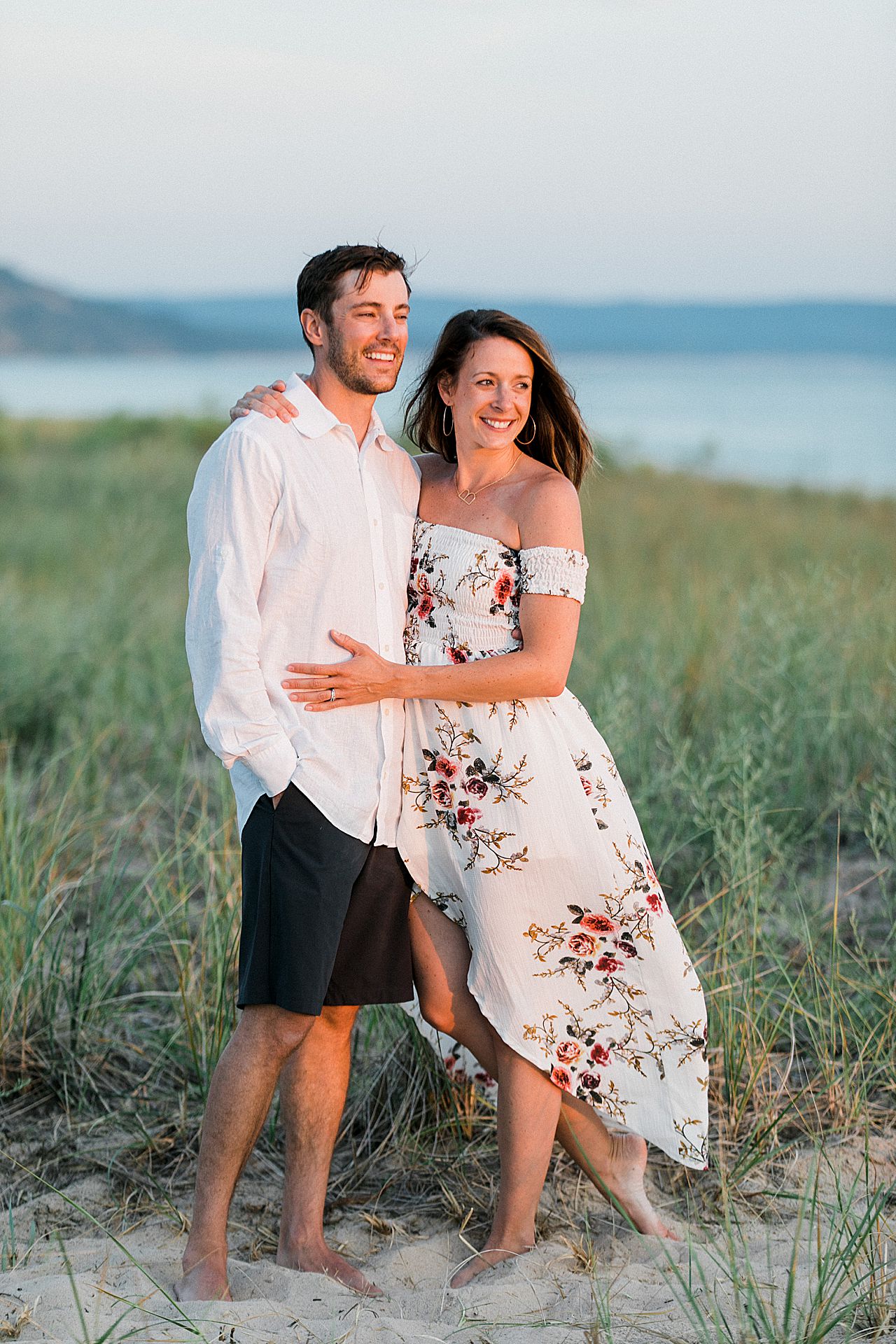 Beautiful couple enjoying the sunset in Frankfort, Michigan
