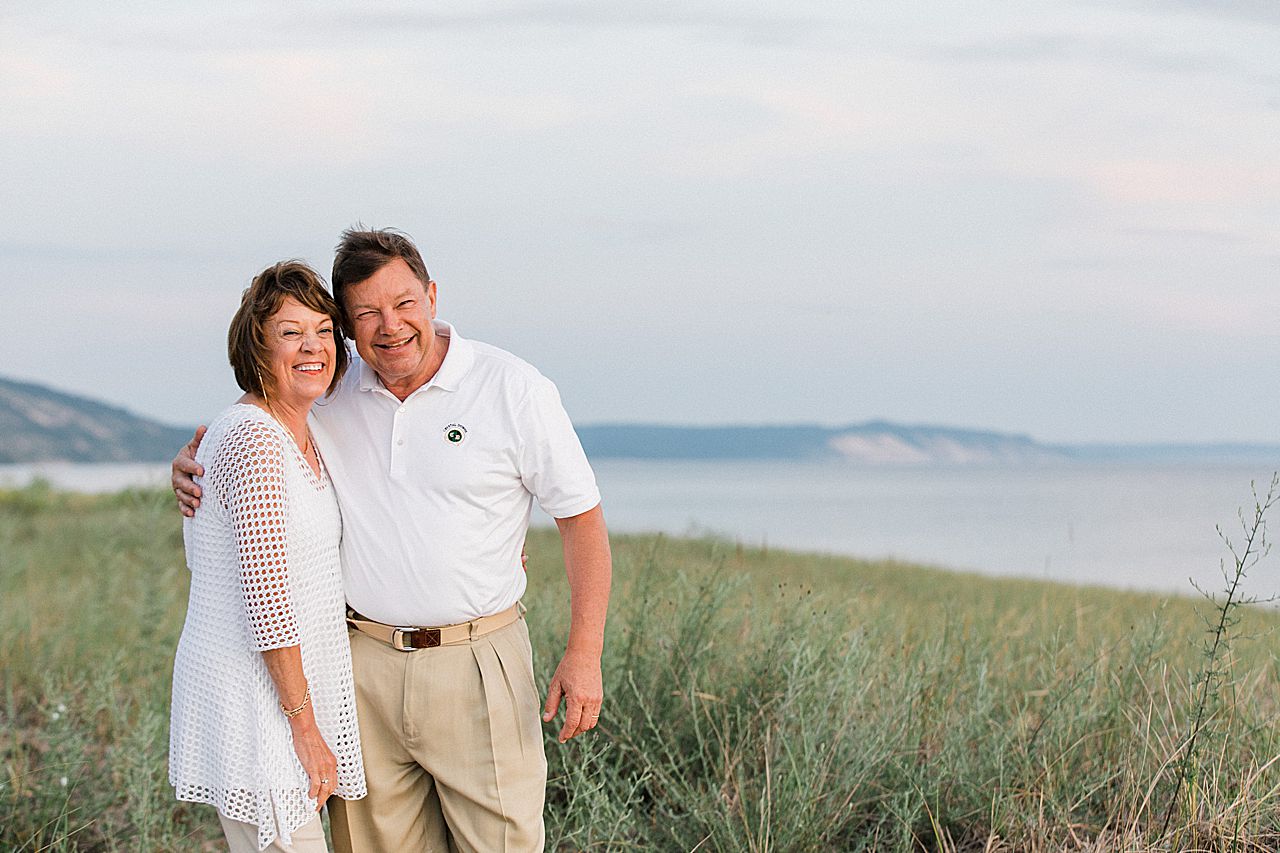 Grandparents on a beach in Frankfort, Michigan