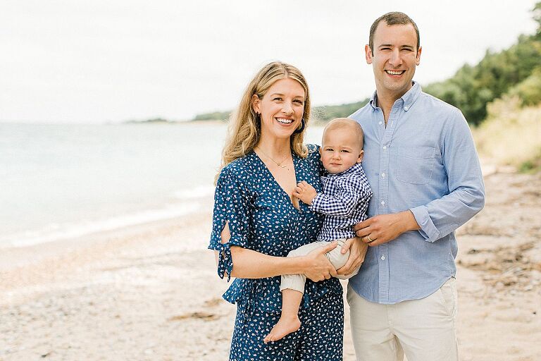 Young couple with their son on a beach