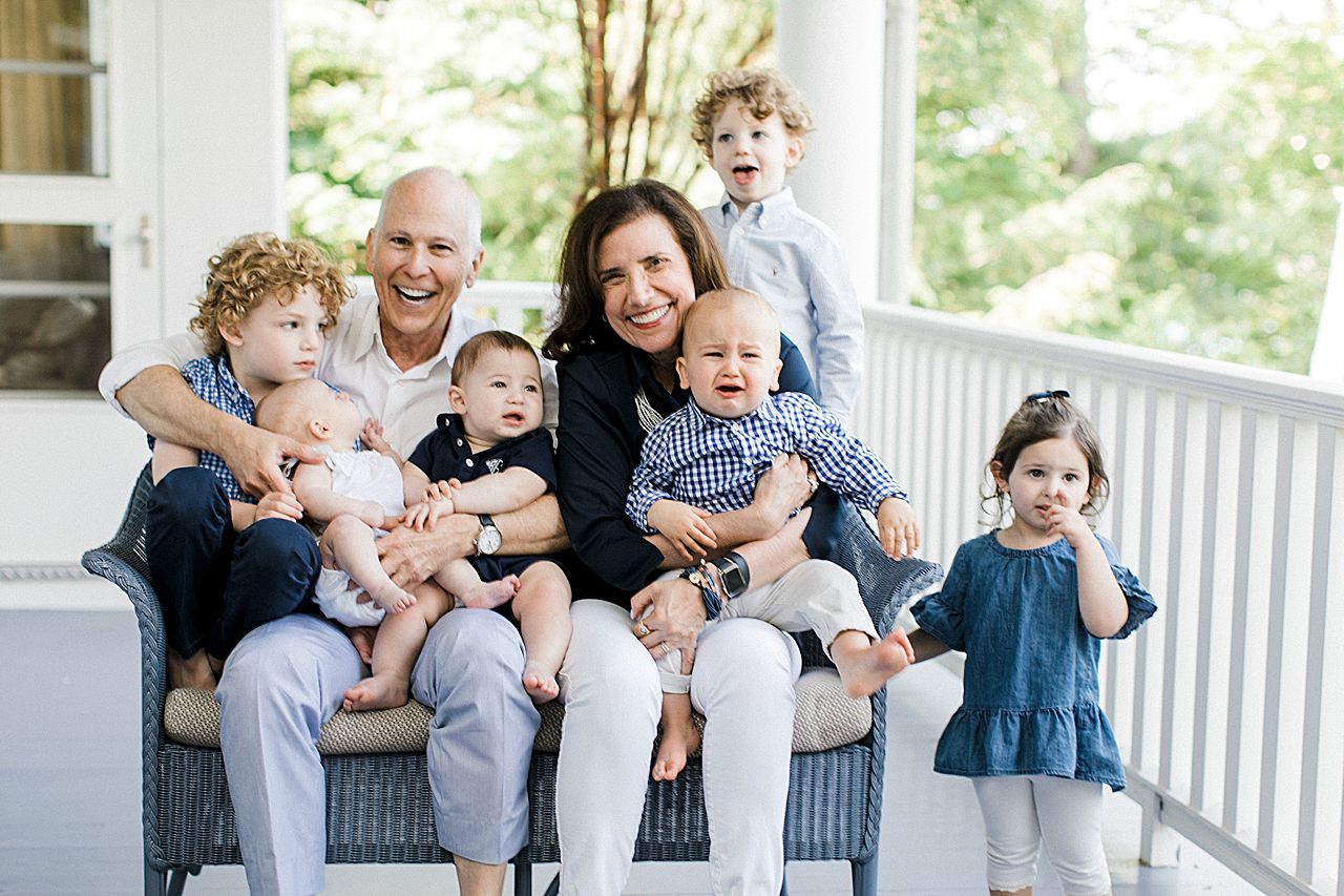 Grandparents on a porch with their grandkids in Northern Michigan